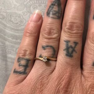 Pear shaped diamond solitaire ring